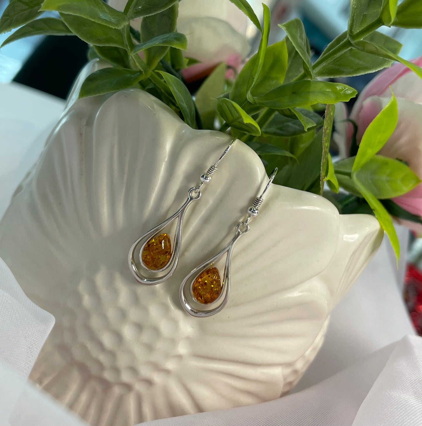 Pear shaped amber drop earrings with fish hooks