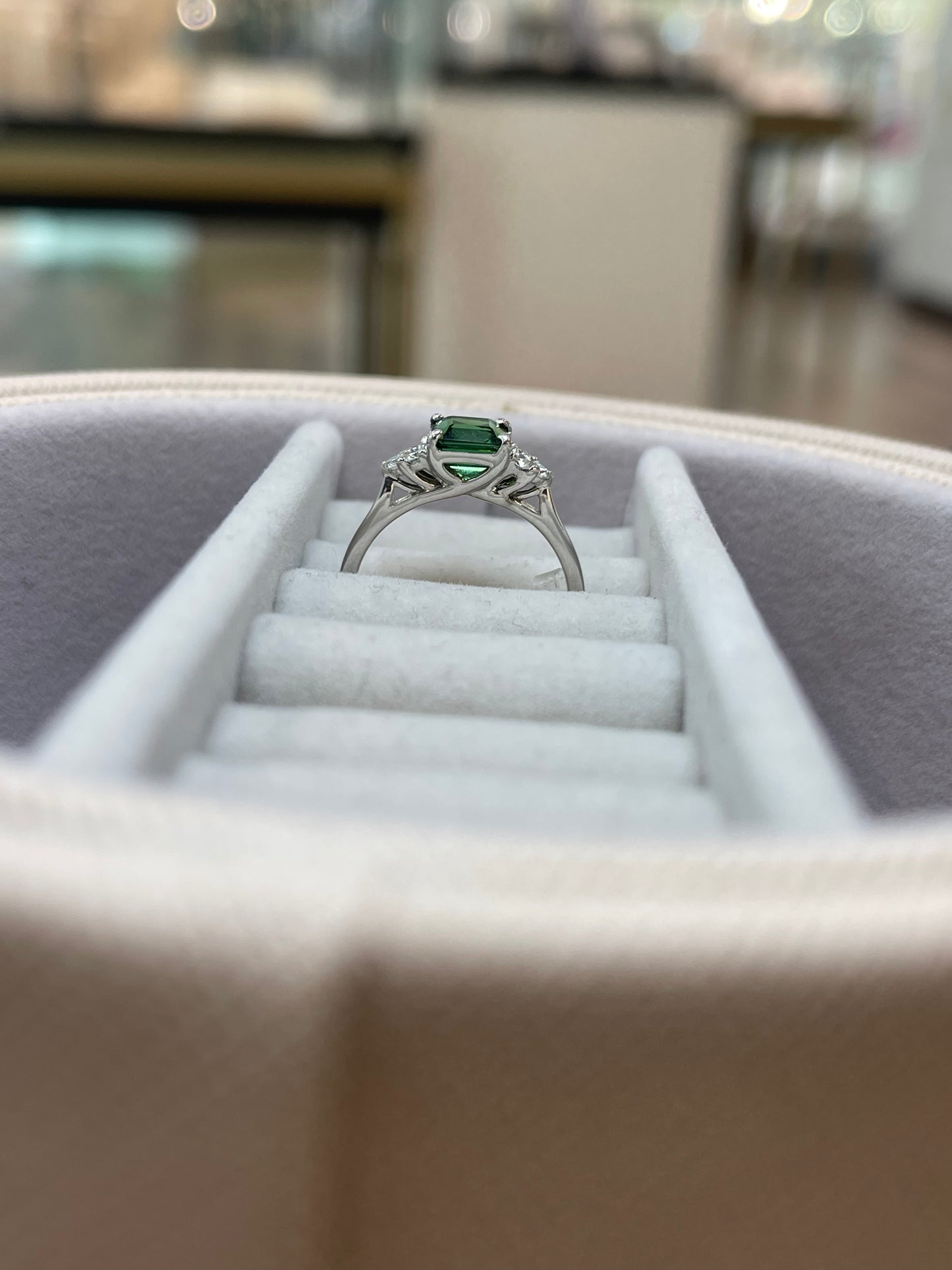 Green tourmaline ring with trefoil diamond setting on shoulders Size M