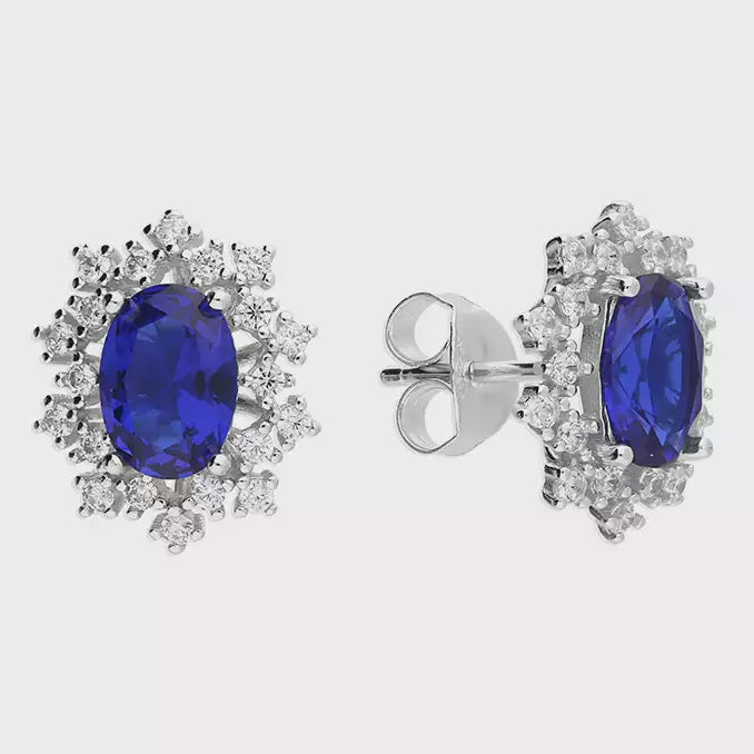 Antique effect white cubic zirconia surround with nano blue centre stud
