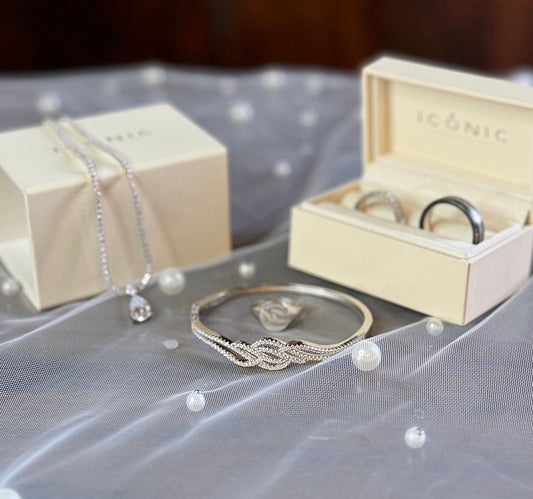 Sterling Silver Rhodium Plated CZ Elliptic Wave Bangle