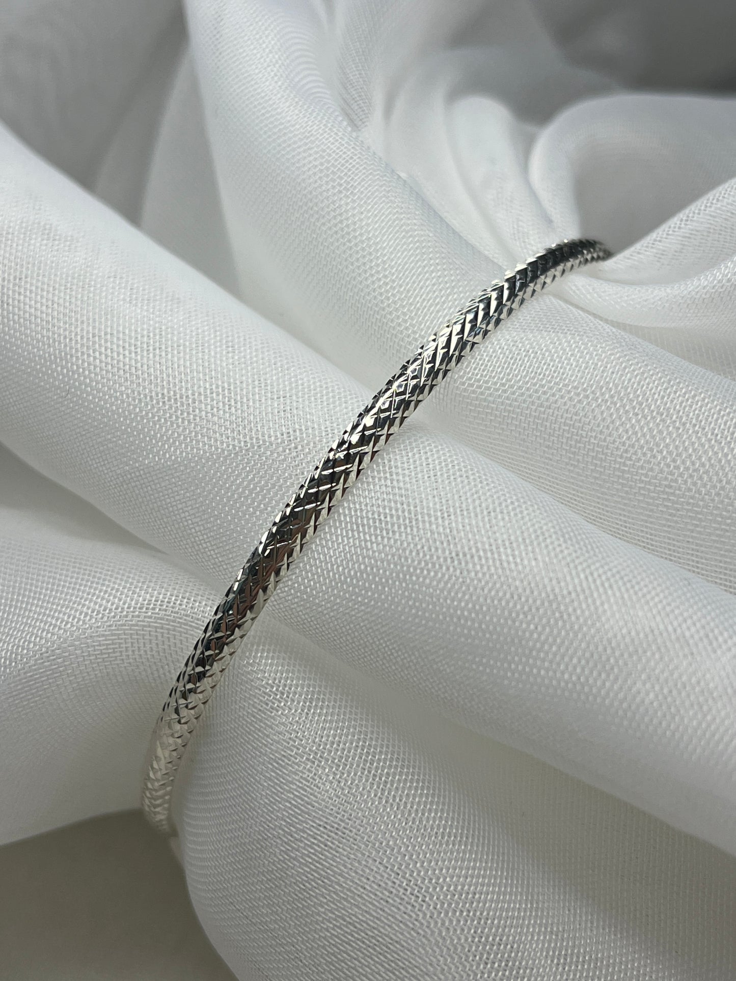 Criss-Crossed Diamond Cut Thin Solid Slave Silver Bangle