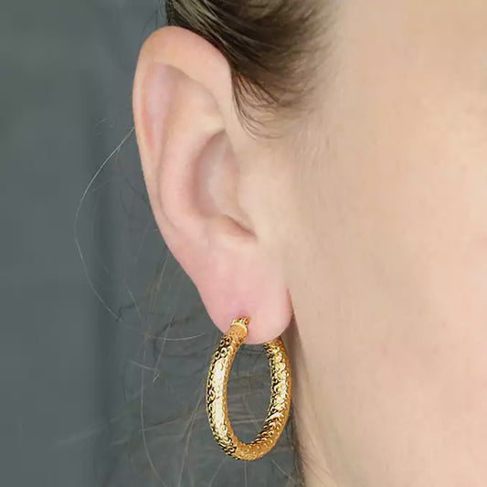 Yellow gold-plated textured hinged hoop with creole fitting