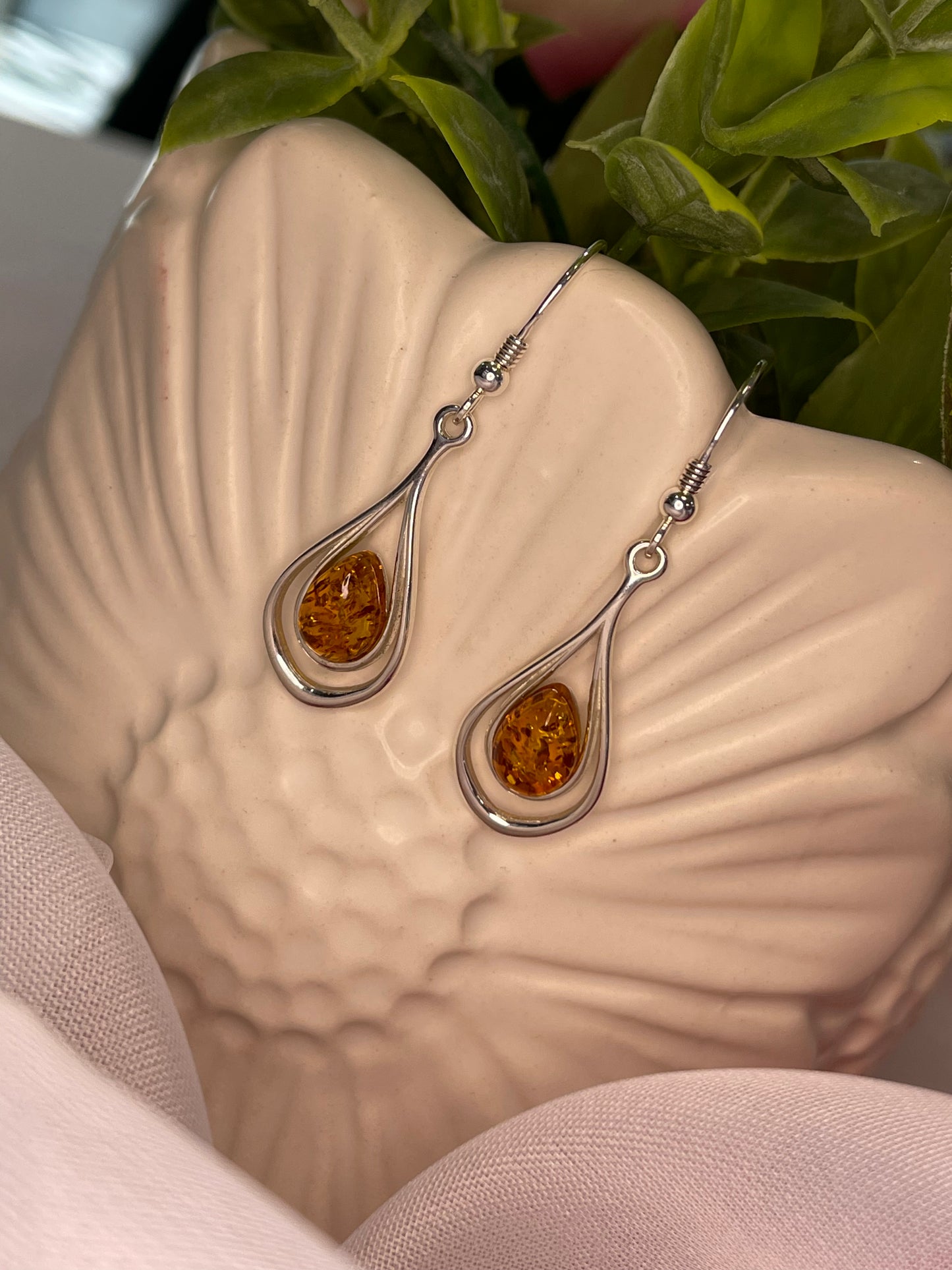 Pear shaped amber drop earrings with fish hooks