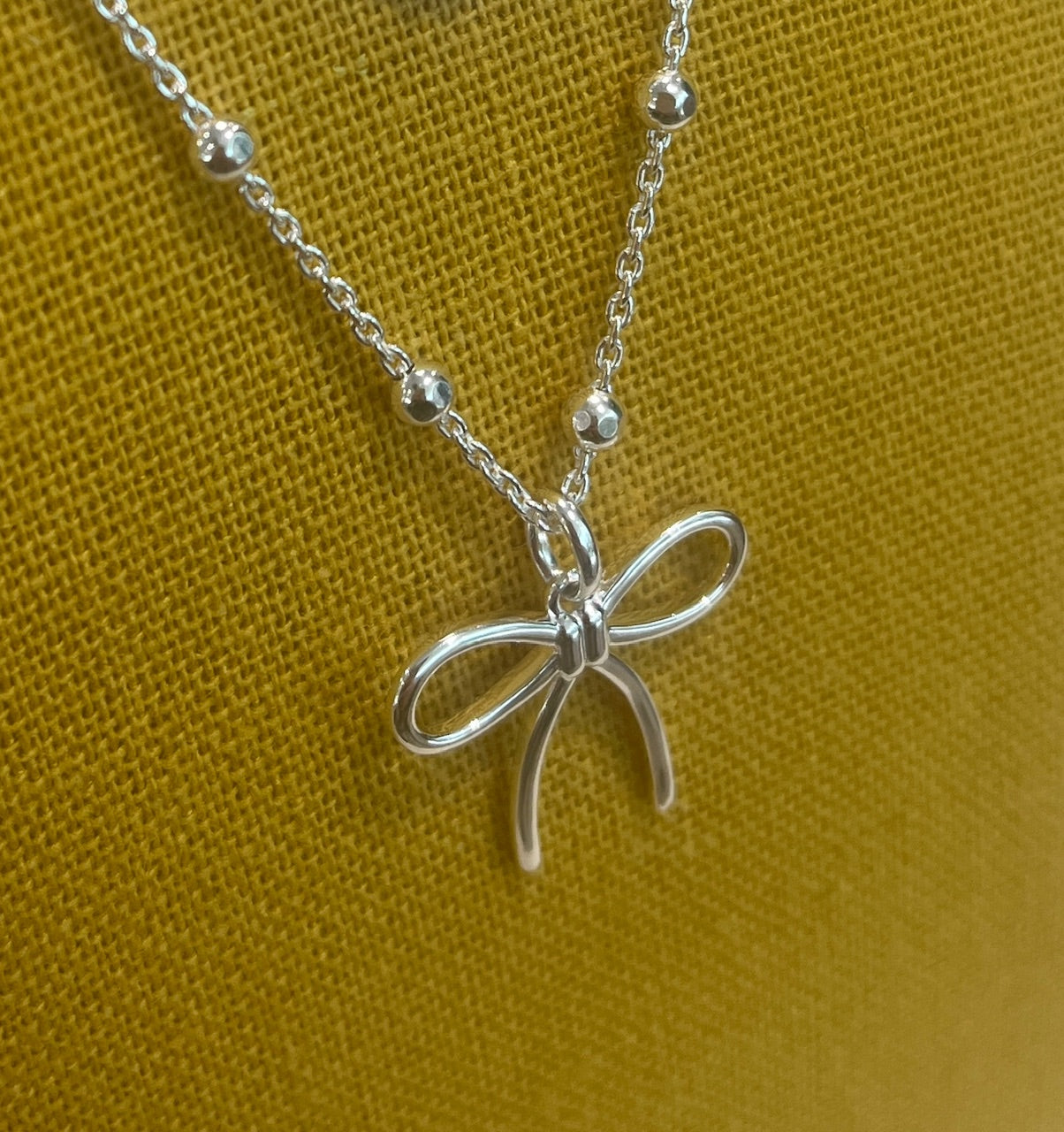 Bow Pendant on Bead Chain