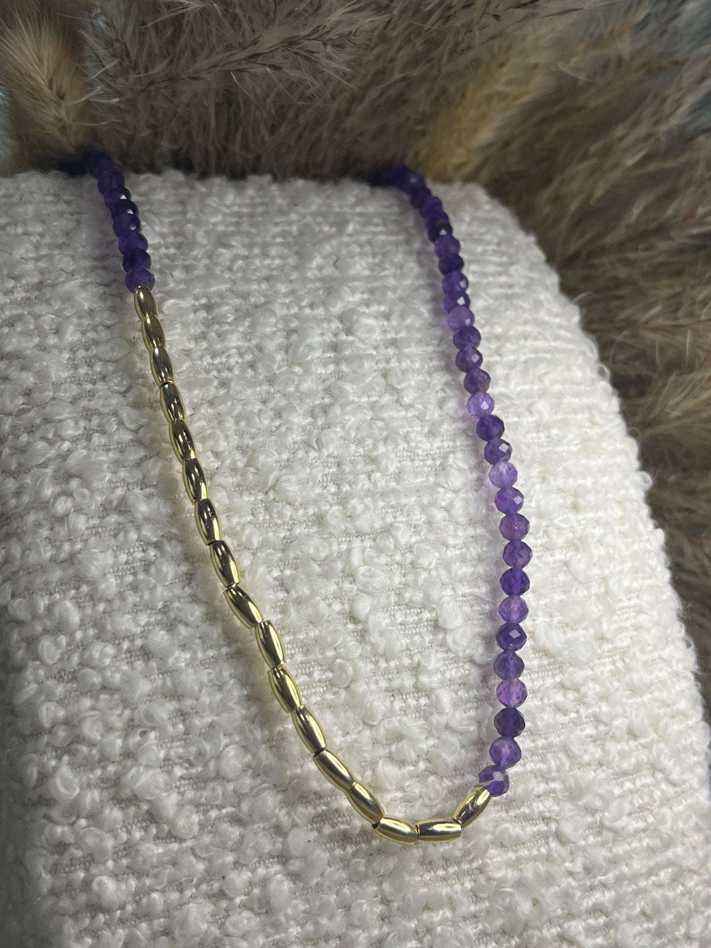 Asymmetric yellow gold-plated seed chain and natural amethyst with 41-46cm extender.