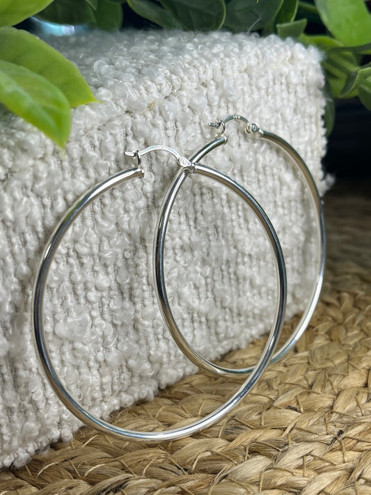 Silver 60mm hoops with creole fitting.