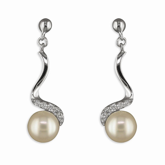 White freswater pearl on cubic zirconia squiggle drop earrings