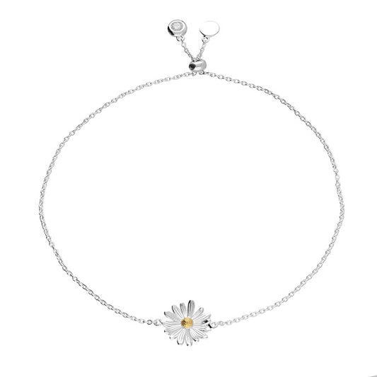 Two-tone daisy slider with cubic zirconia charm