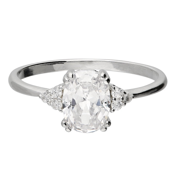 Cubic zirconia solitaire with triangle of triples either side
