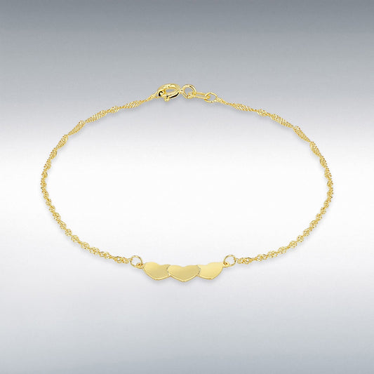 9CT YELLOW GOLD TRIPLE-HEART TWIST CURB BRACELET 18CM