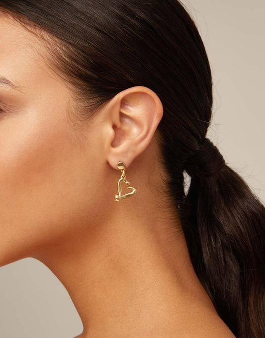 Nailed heart drop earrings gold